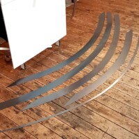 Auftragsarbeit für eine Immobilie in Metzingen 2026: gesägte Seitenteile ausgesägte Stahlbleche